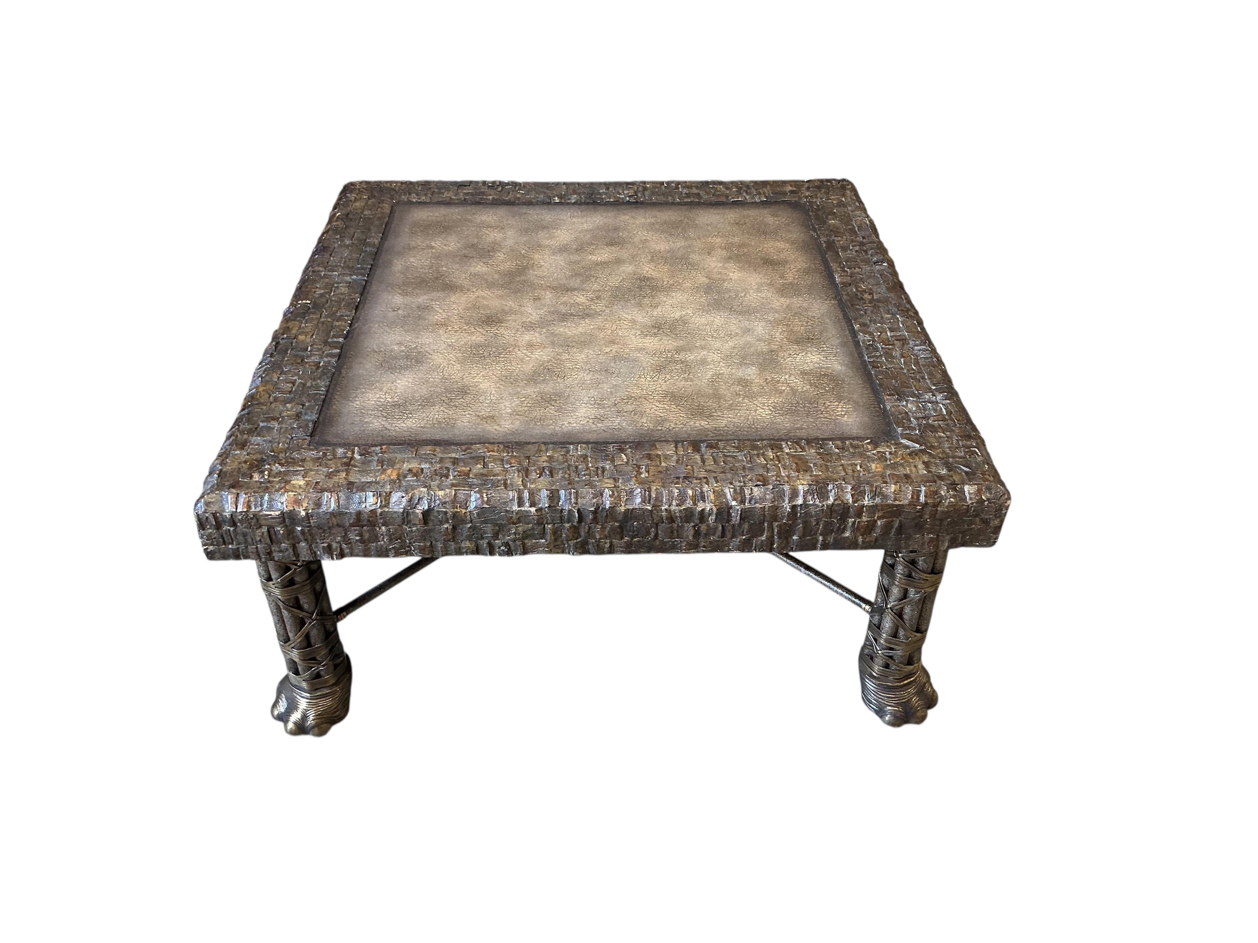 A Contemporary Maitland Smith square brass, leather top coffee table on cluster column, elephant foot supports, 108cm, height 48cm